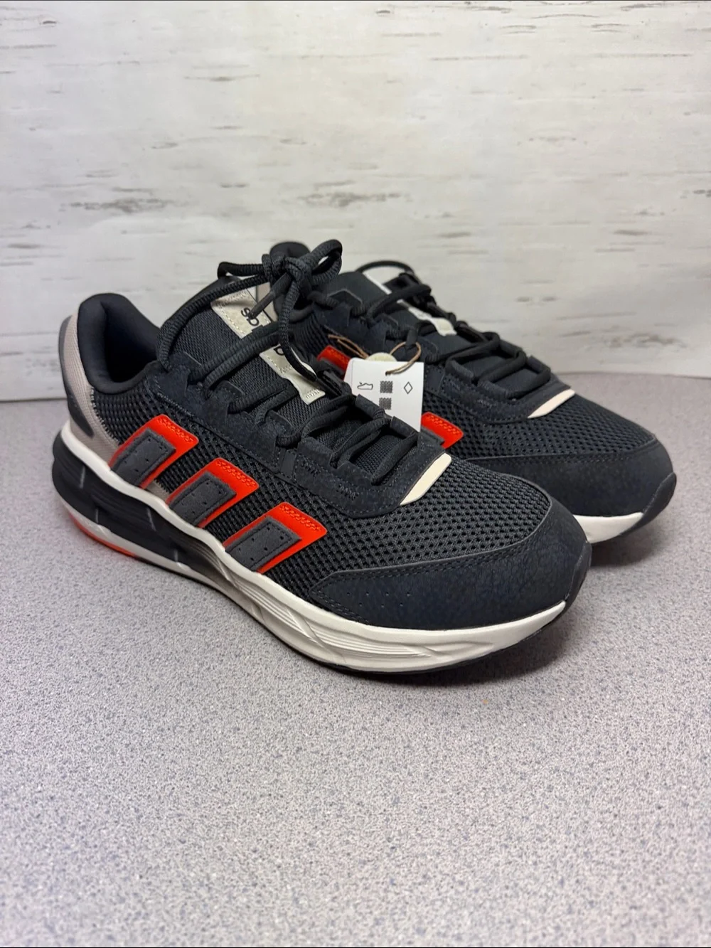 adidas Black Sneakers with Red Stripe Accents